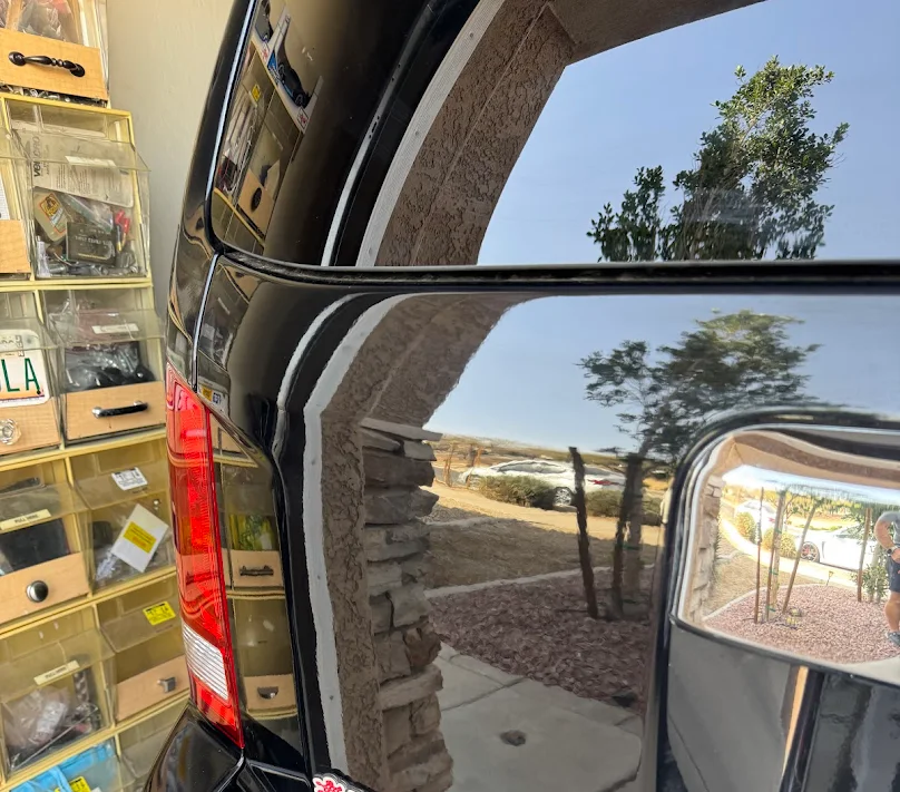 Tahoe · trunk dent. After repair